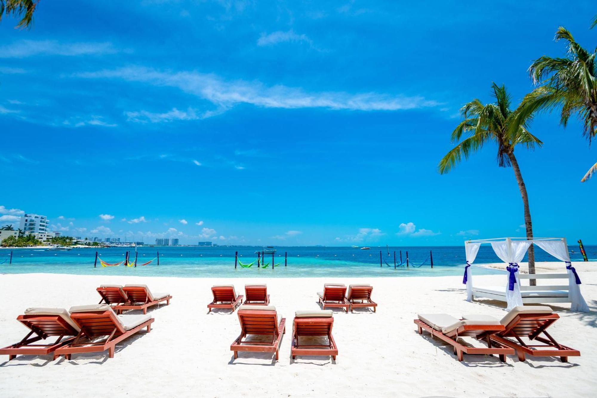فندق غراند أويسيز بالم شامل كليًا كانكون المظهر الخارجي الصورة Beach at the Grand Palladium Hotel