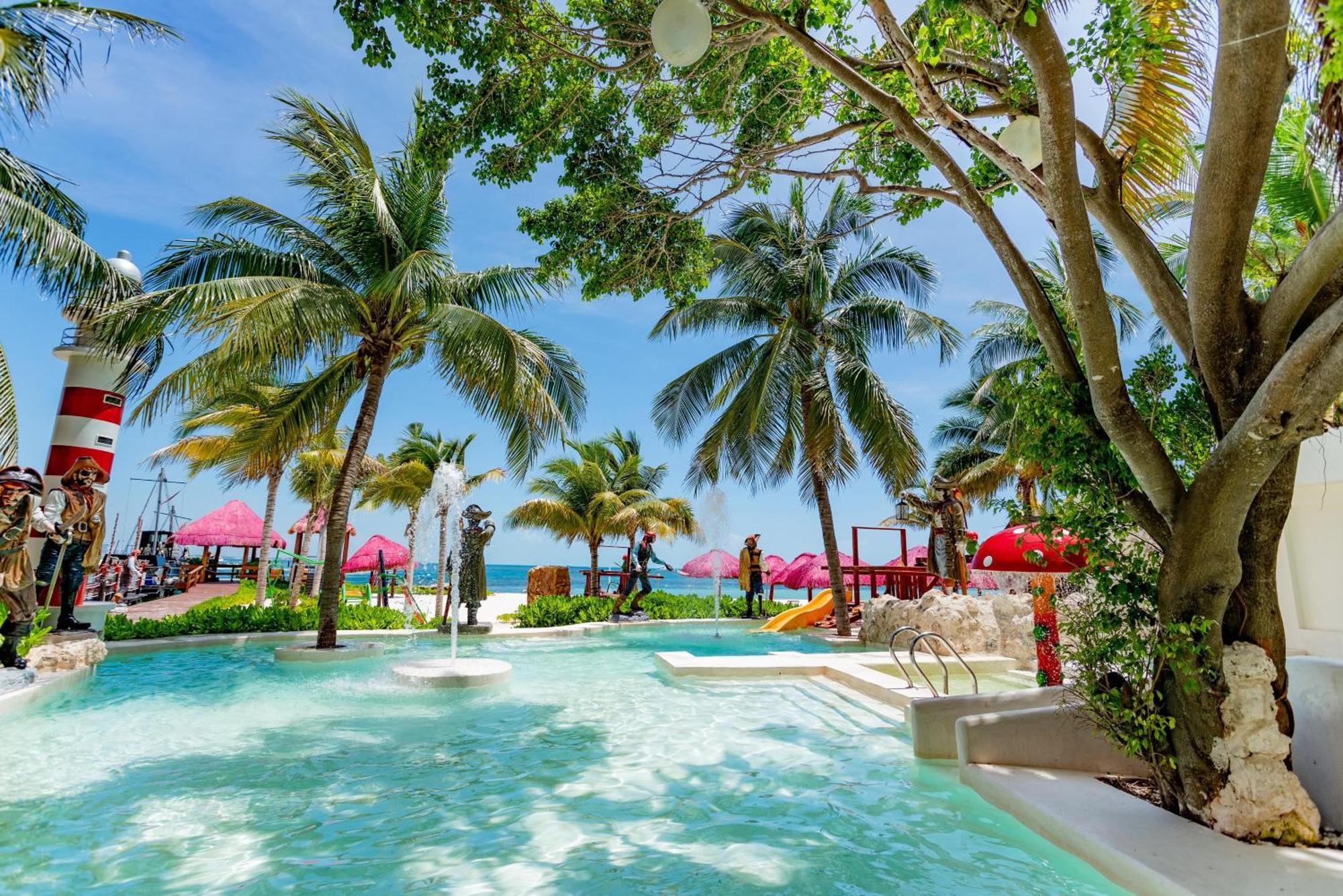 فندق غراند أويسيز بالم شامل كليًا كانكون المظهر الخارجي الصورة The beach at the resort